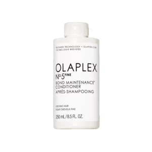 Witte fles Olaplex No.5 Fine Bond Maintenance Conditioner van 250 ml tegen een zwarte achtergrond.