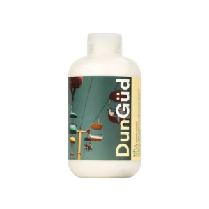 Fles DunGüd Lift Volumising Conditioner met kleurrijke stoeltjeslift-afbeelding op het etiket.