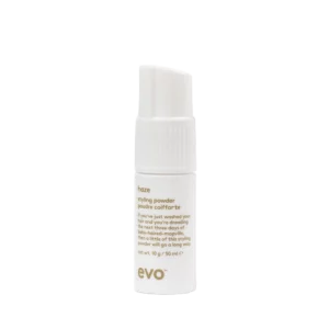 Witte flacon van 10 g evo haze styling powder met pompdispenser.