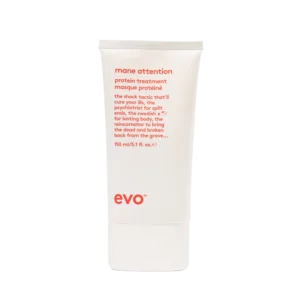 Witte tube van het merk Evo met de tekst "mane attention protein treatment" in rode letters op de voorkant.