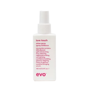 Witte fles van 100 ml Evo Love Touch shine spray met roze tekst op de voorkant.