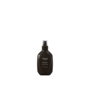 Zwarte flacon van Urban Alchemy Easy Dry Oil Smooth Supreme met pompdispenser.